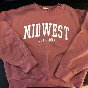 Cute sweatshirt in great condition. Runs small.